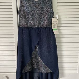 Girls fancy sheath dress with chiffon tulip high low overlay.